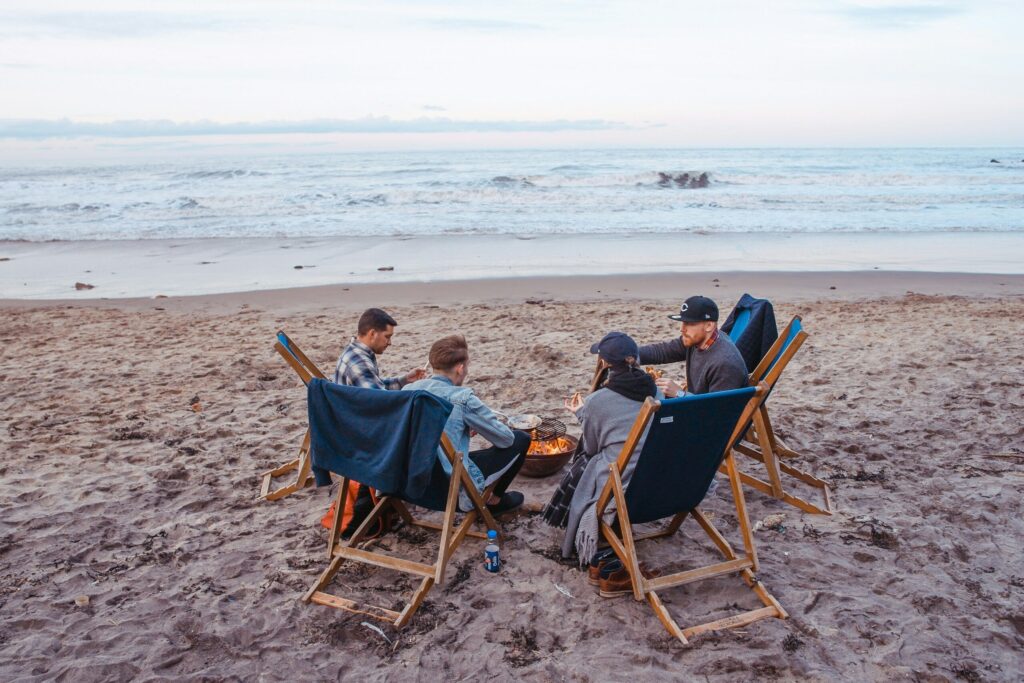 friends talking on beach